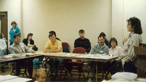 Mardie Caldwell leading an adoption information meeting early on